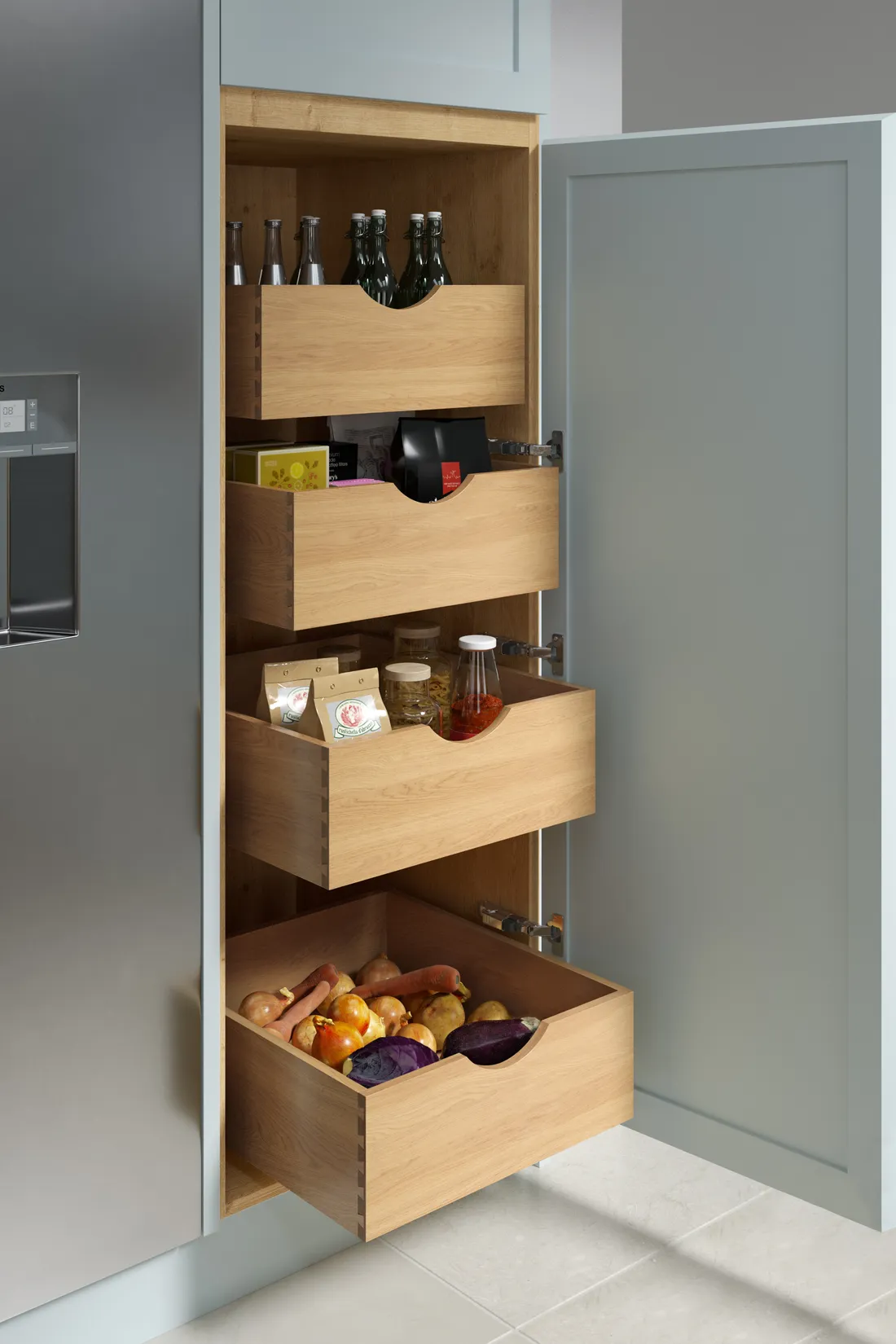 Oak pantry pull-out drawers with dovetail joints, stocked with provisions