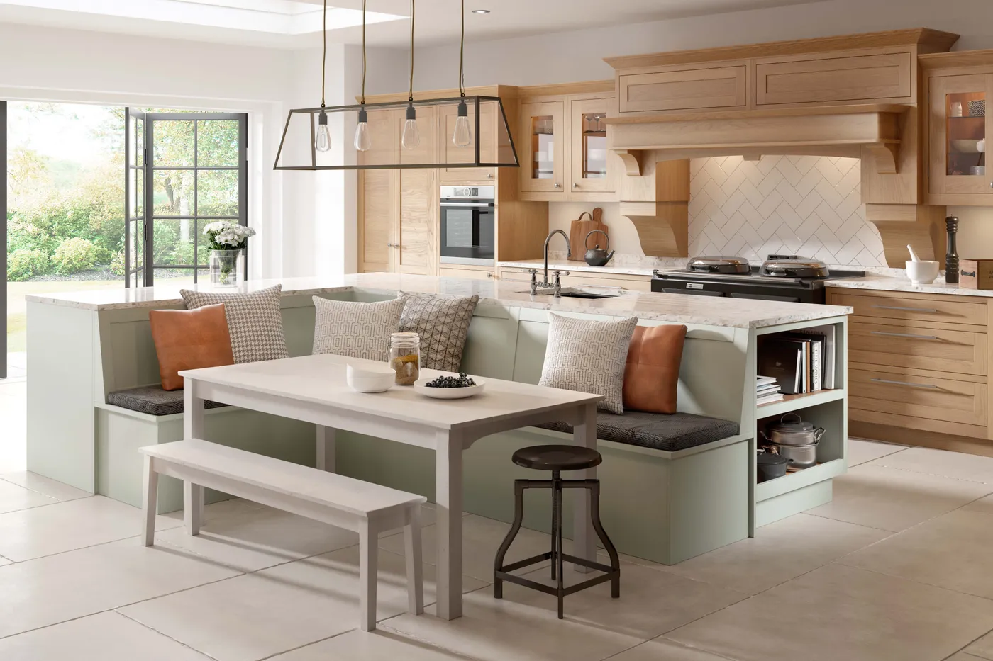 Shaker kitchen in light oak and soft green with banquette seating