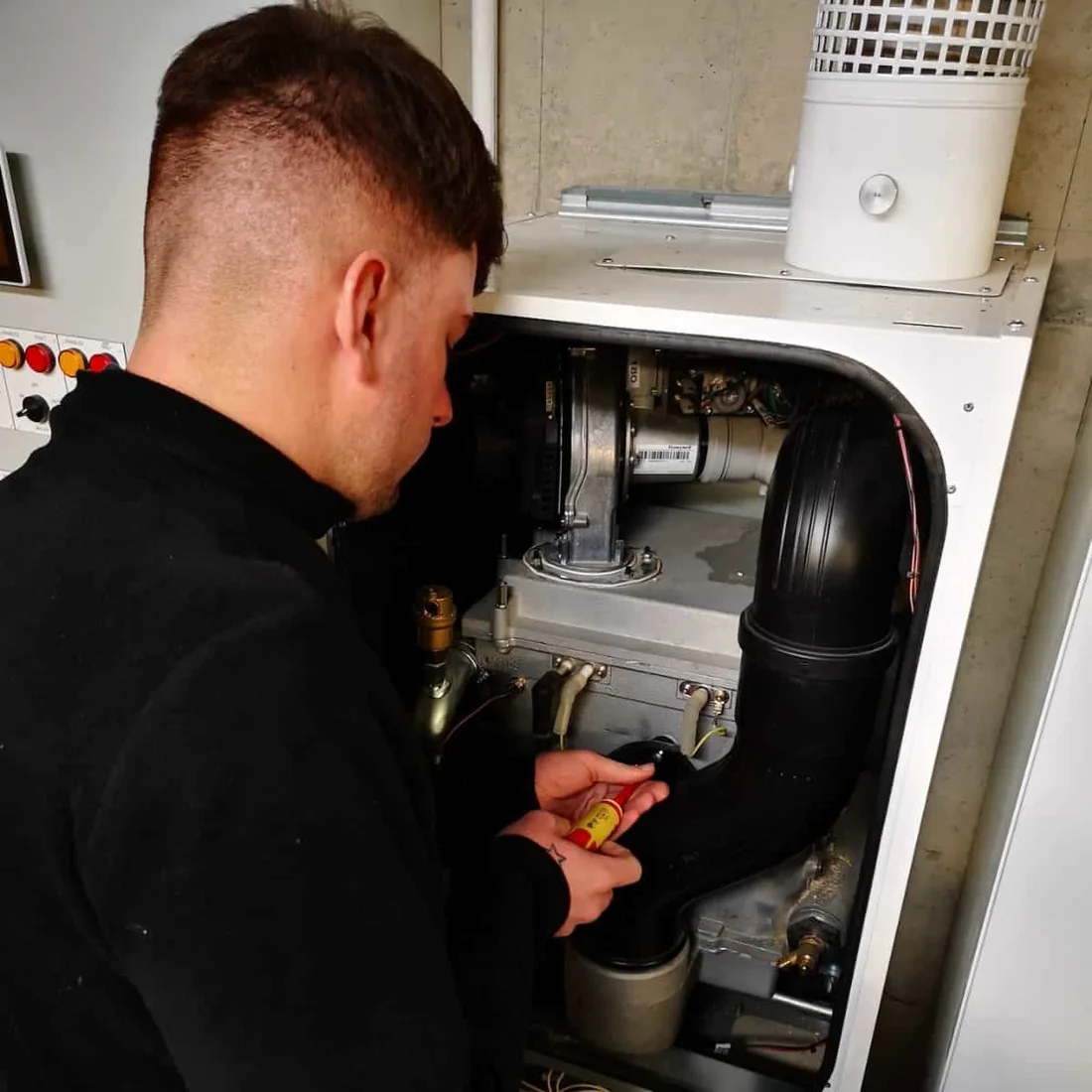 Engineer servicing plant