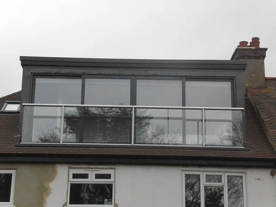 Loft conversion dormer with glass balustrade