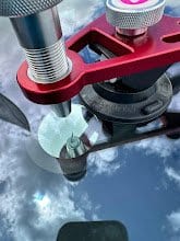Merv's windscreen repair bridge mounted on a customer's glass